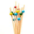 Wooden ball picks in red, yellow, green and blue